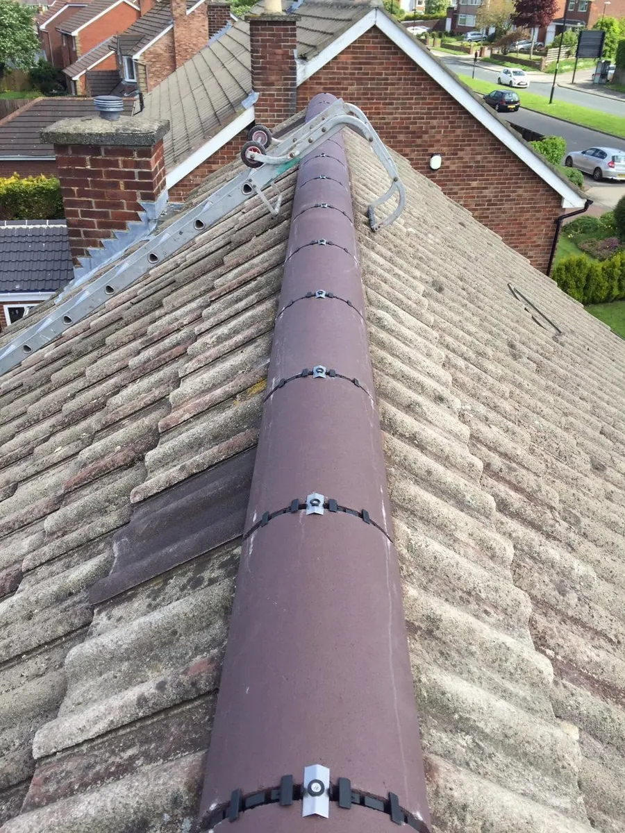 New dry ridge system fitted on a concrete tile roof, Flaherty Roof and Driveways