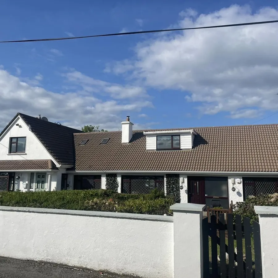 Brown tiled dormer bungalow roof before cleaning, Flaherty Roof and Driveways