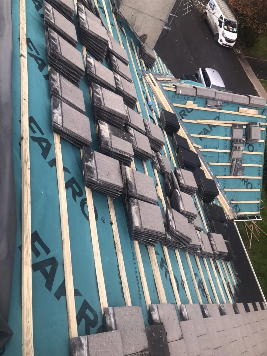 New tiles loaded out on the battens, Flaherty Roof and Driveways